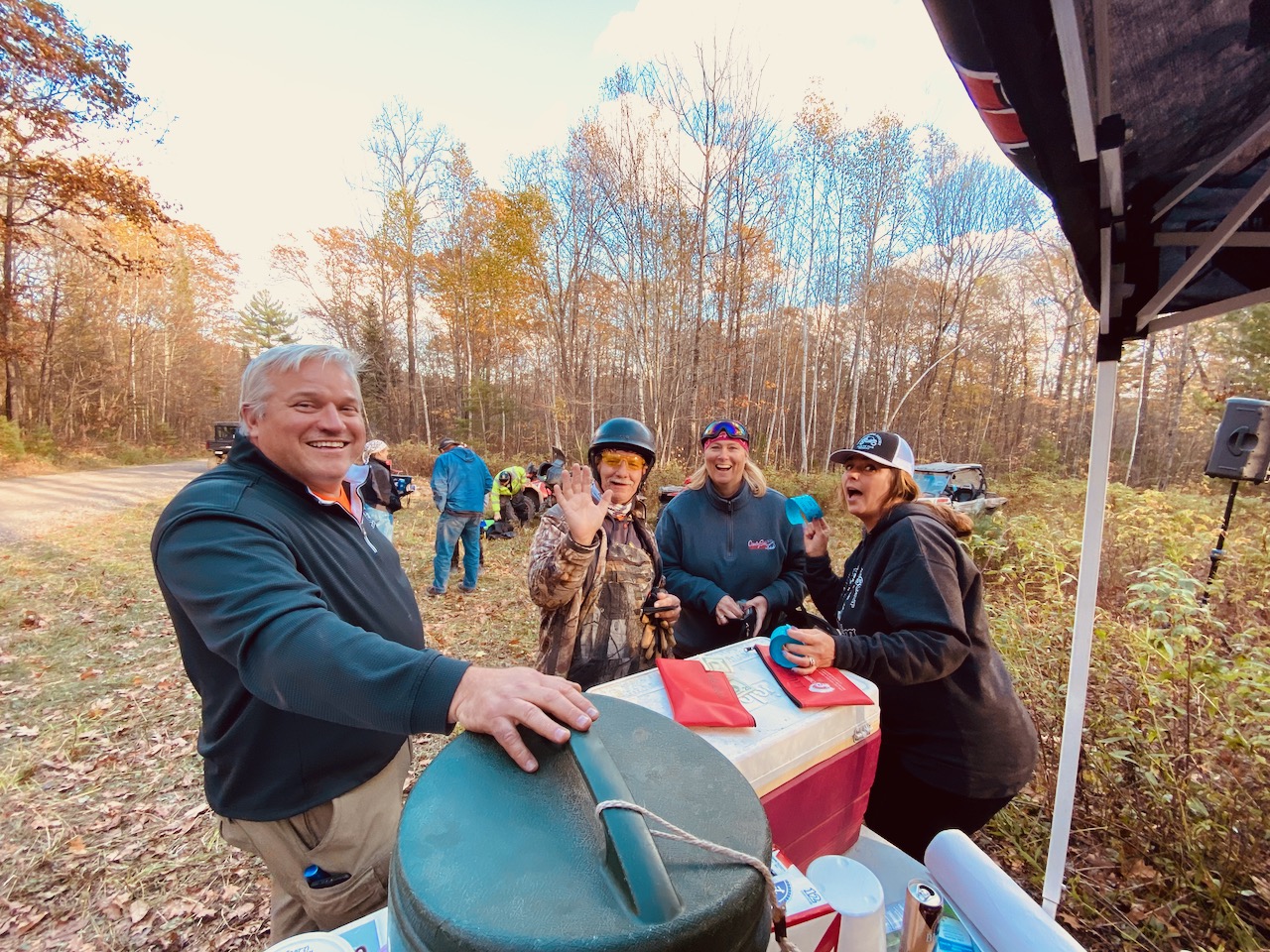 UTV drivers enjoying snacks and drinks