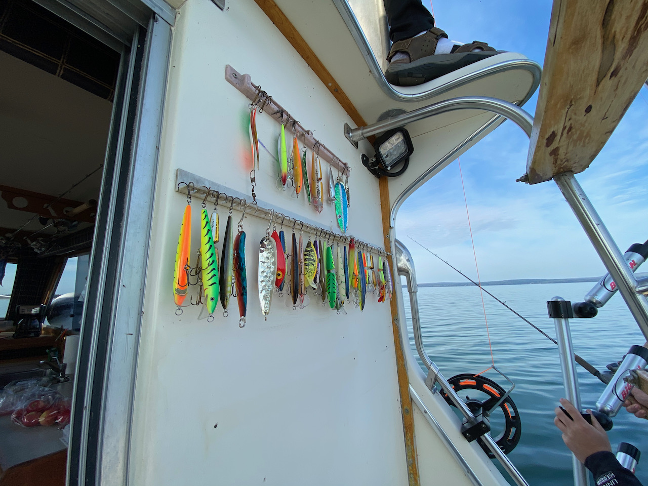 Fishing lures hanging on side of Thunderbird