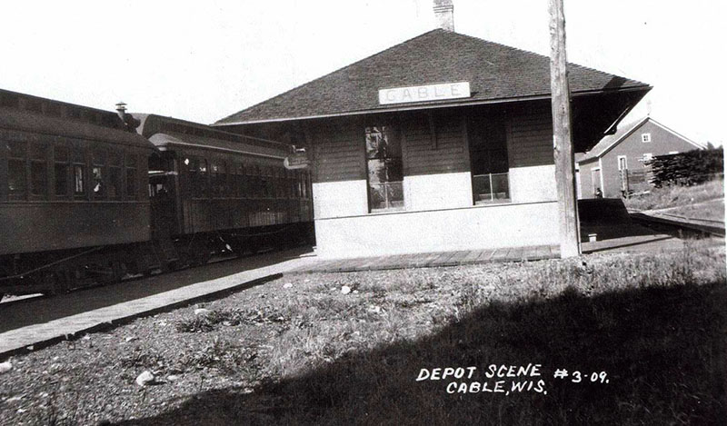 Historic photo of train depot in Cable Wisconsin.