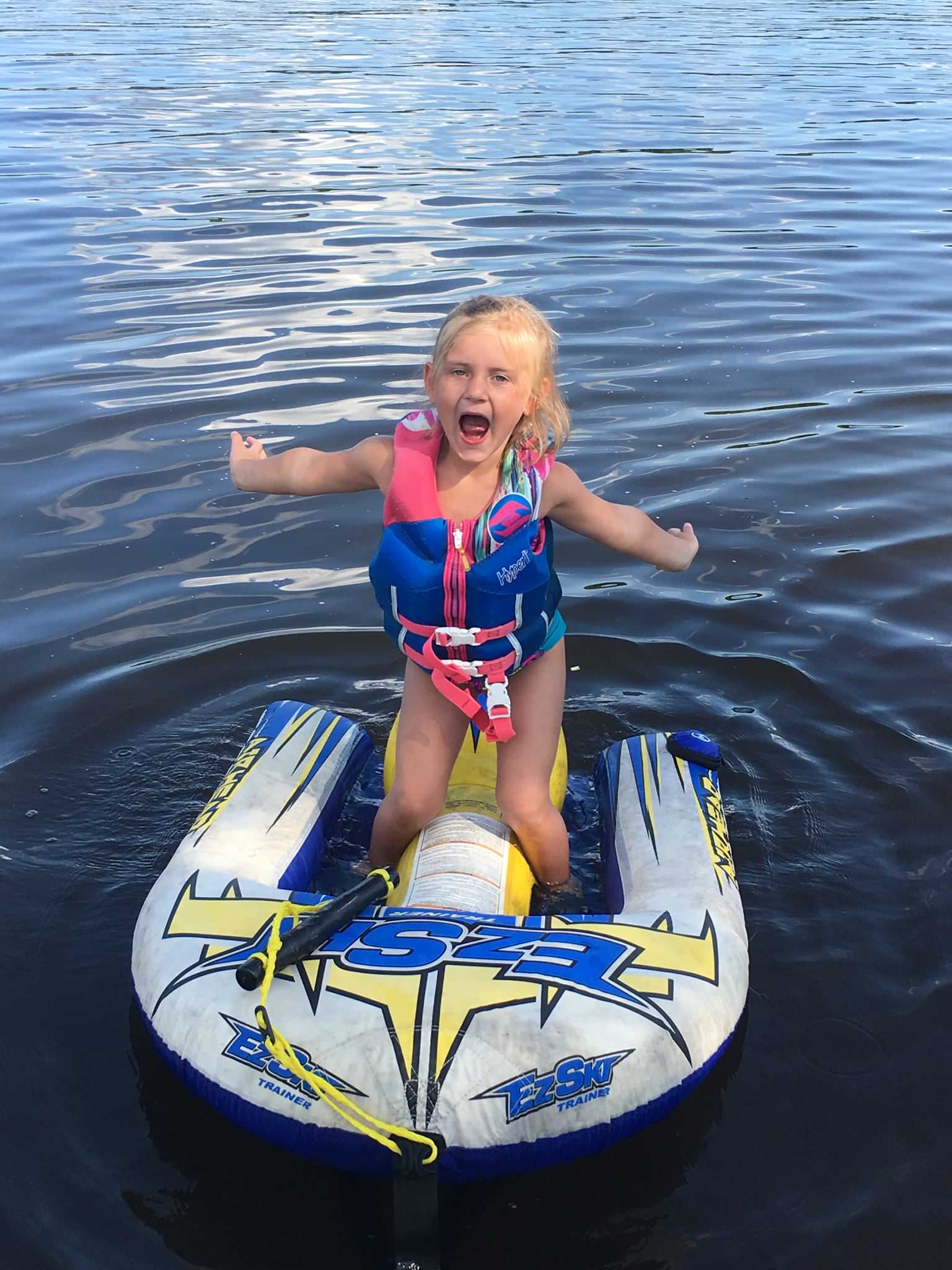 young girl on an inner tube