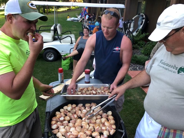 Man taste testing scallops