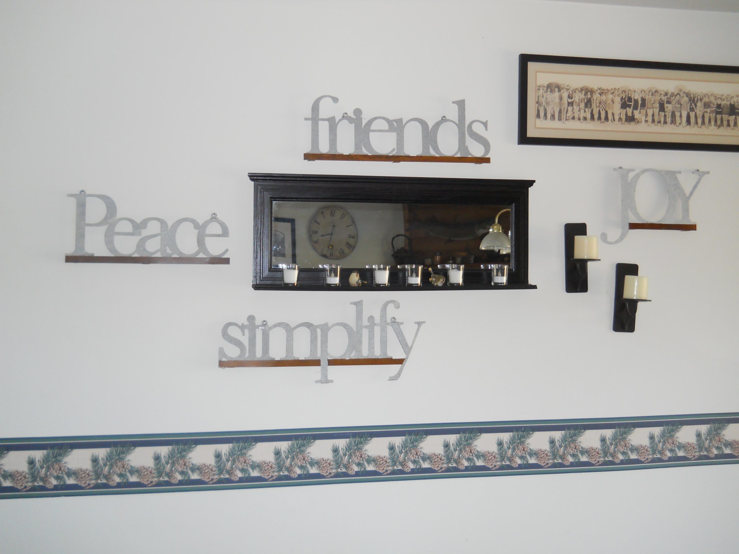 home wall art. text: peace. simplify. friends. joy.
