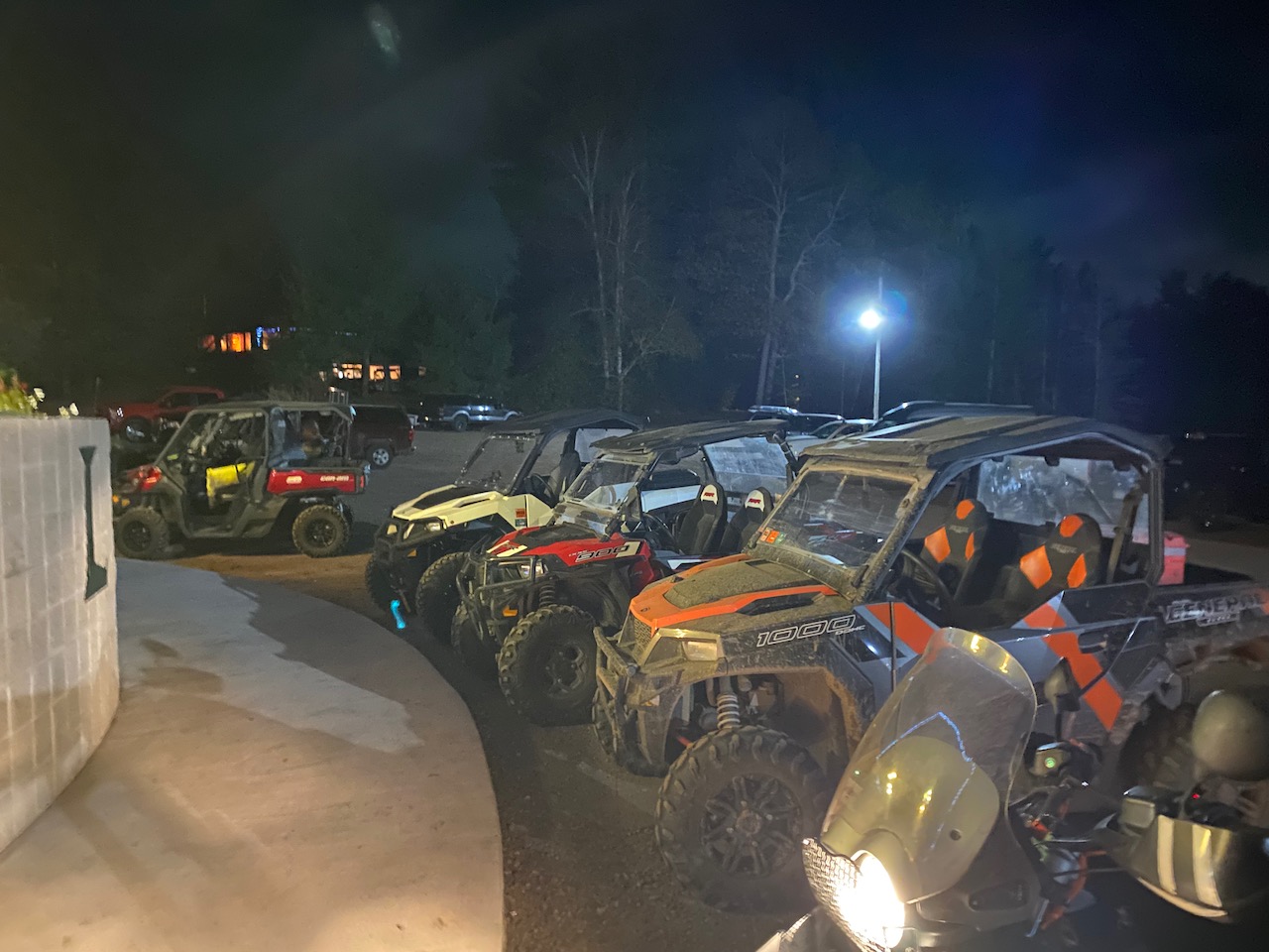 UTVs parked outside Lakewoods Resort at night