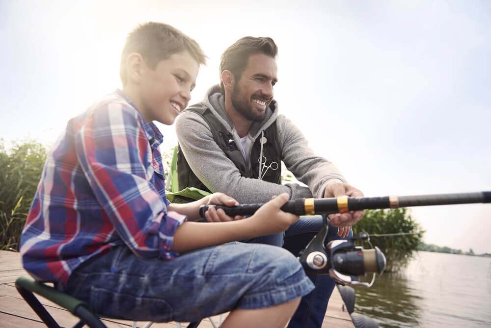 A father and sun enjoying the outdoors fishing in Cable, Wisconsin